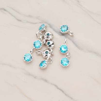 Cubic Zirconia Textured Framed Charm Pendant, 2 Pc on warm marble background (PD.780)
