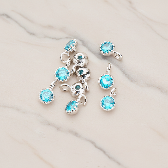 Cubic Zirconia Textured Framed Charm Pendant, 2 Pc on warm marble background (PD.780)