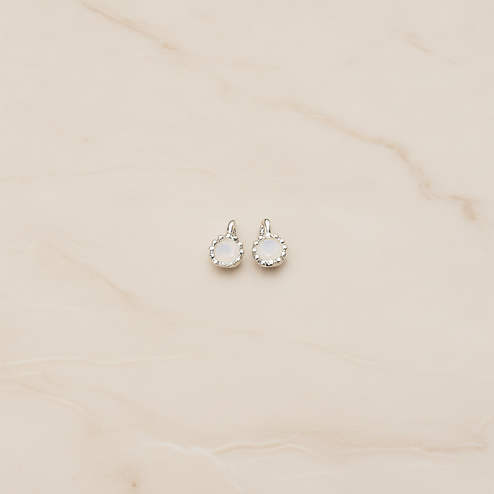 Cubic Zirconia Textured Framed Charm Pendant, 2 Pc on warm marble background (PD.780)