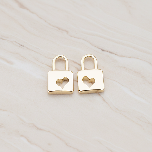 Heart Punched Lock Charm Pendant, 2 Pc on warm marble background (PD.810)