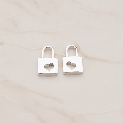 Heart Punched Lock Charm Pendant, 2 Pc on warm marble background (PD.810)