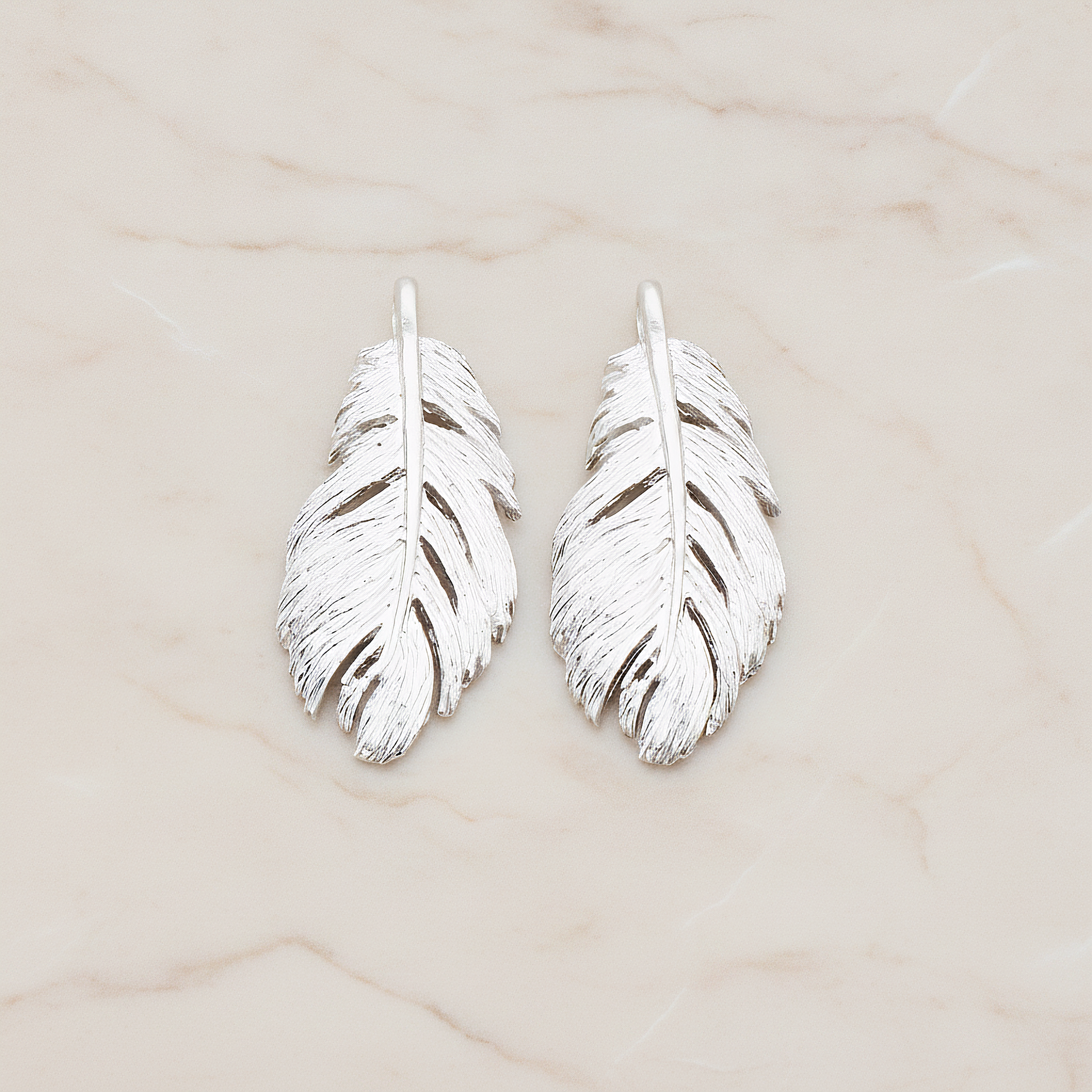 Feather Pendant, 2 Pc on warm marble background (PD.822)