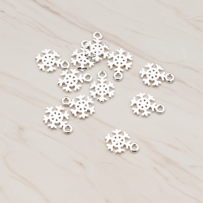 Snow Flake Charm Pendant, 2 Pc on warm marble background (PD.835)