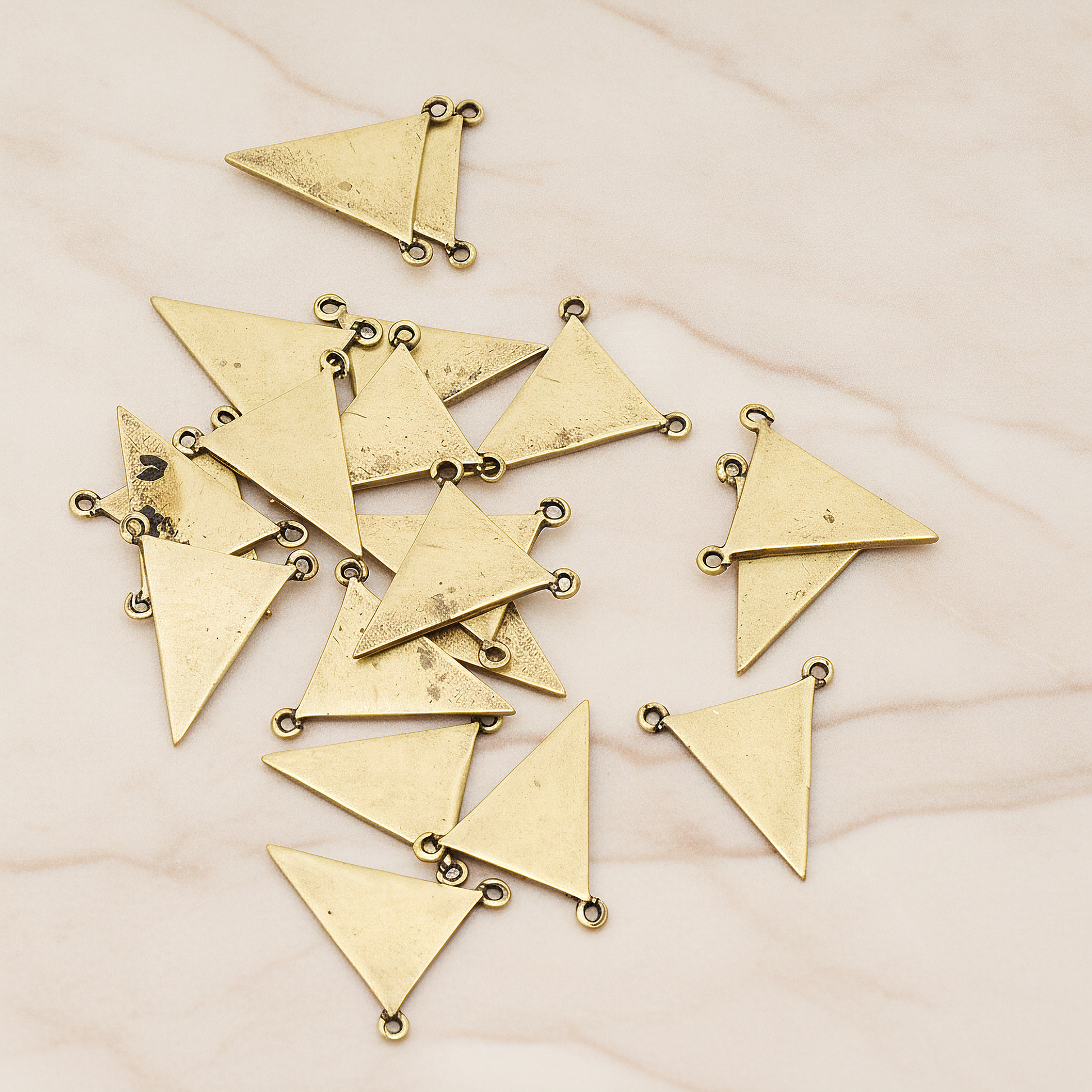 Plain Flat Triangle Double Loops Pendant, 2 Pc on warm marble background (PD.837)