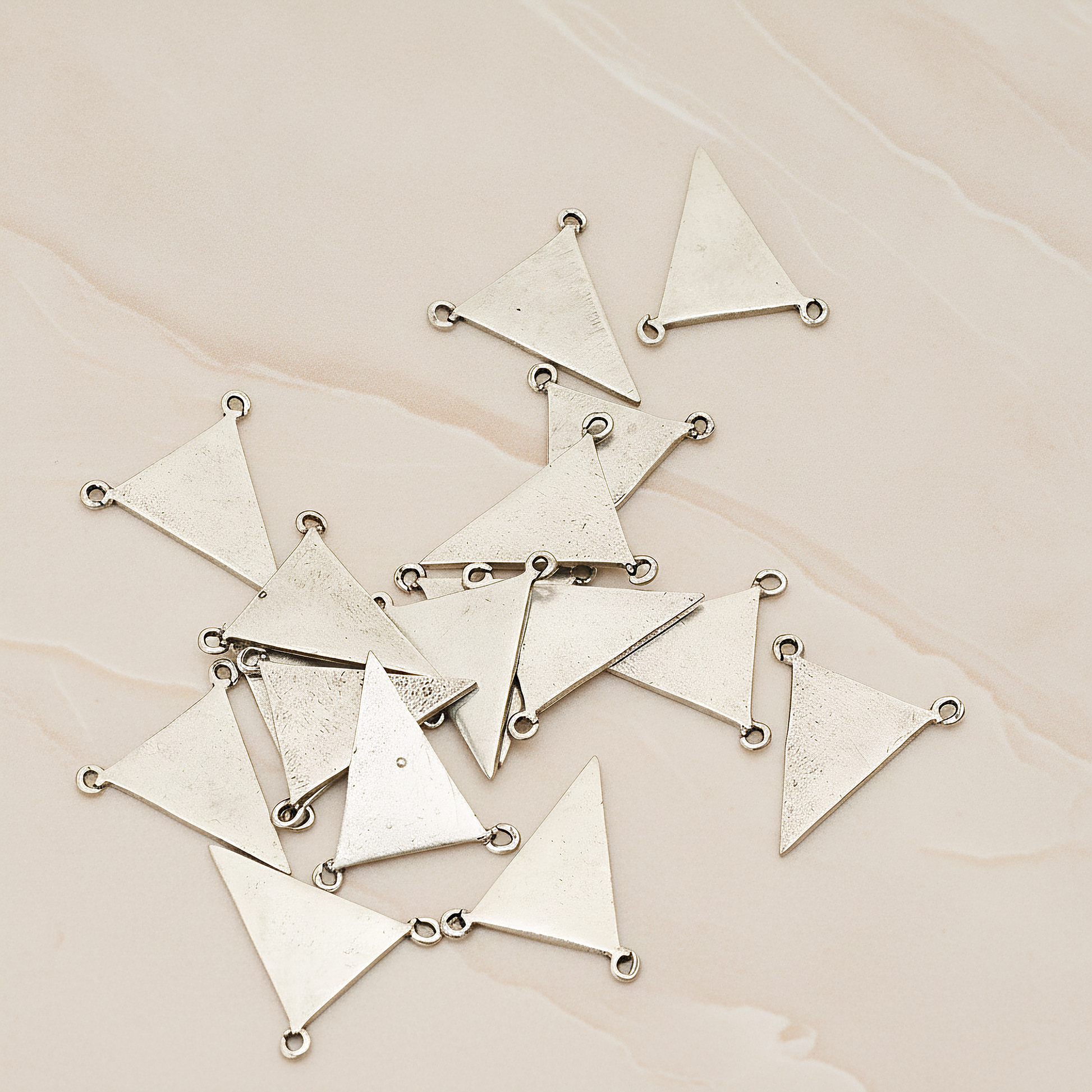 Plain Flat Triangle Double Loops Pendant, 2 Pc on warm marble background (PD.837)