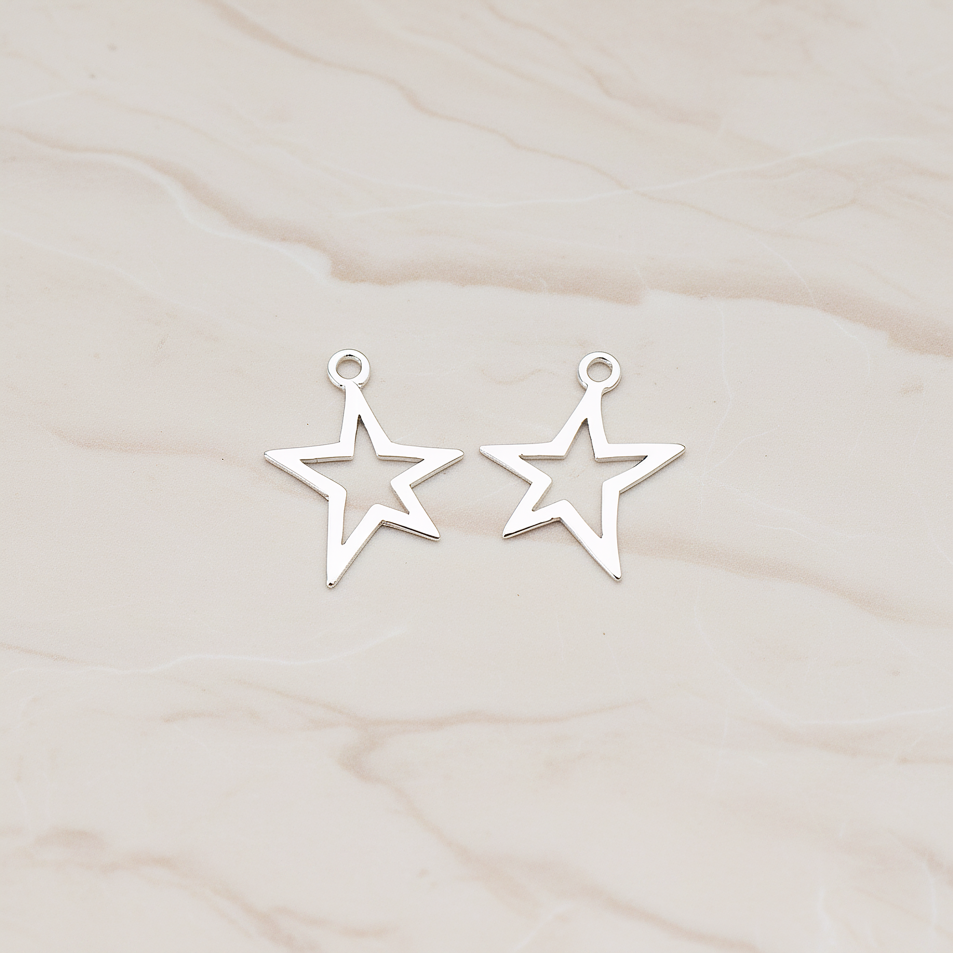 Funky Star Pendant, 2 Pc on warm marble background (PD.876)