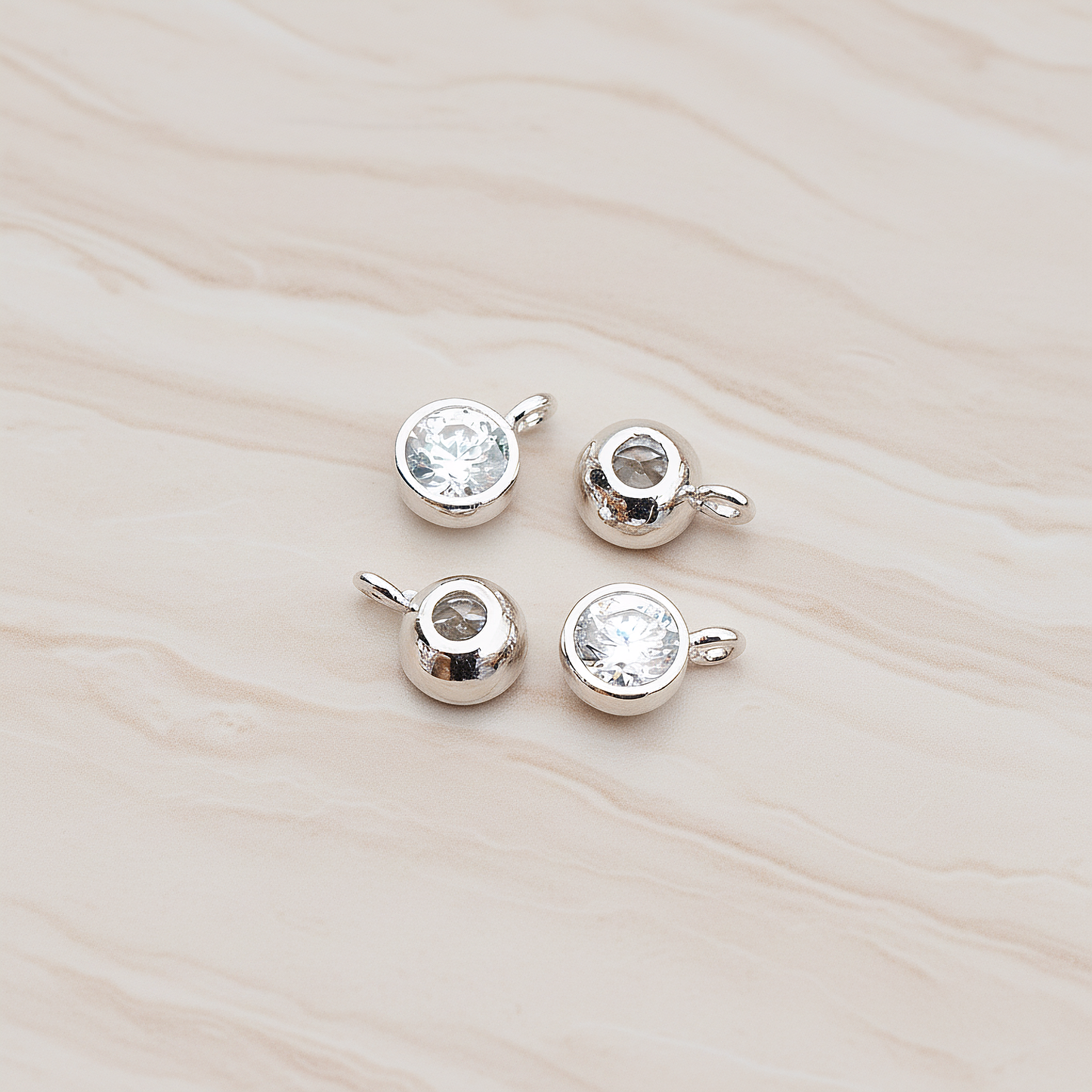 Round Smooth Framed Cubic Zirconia Pendant, 2 Pc on warm marble background (PD.883)
