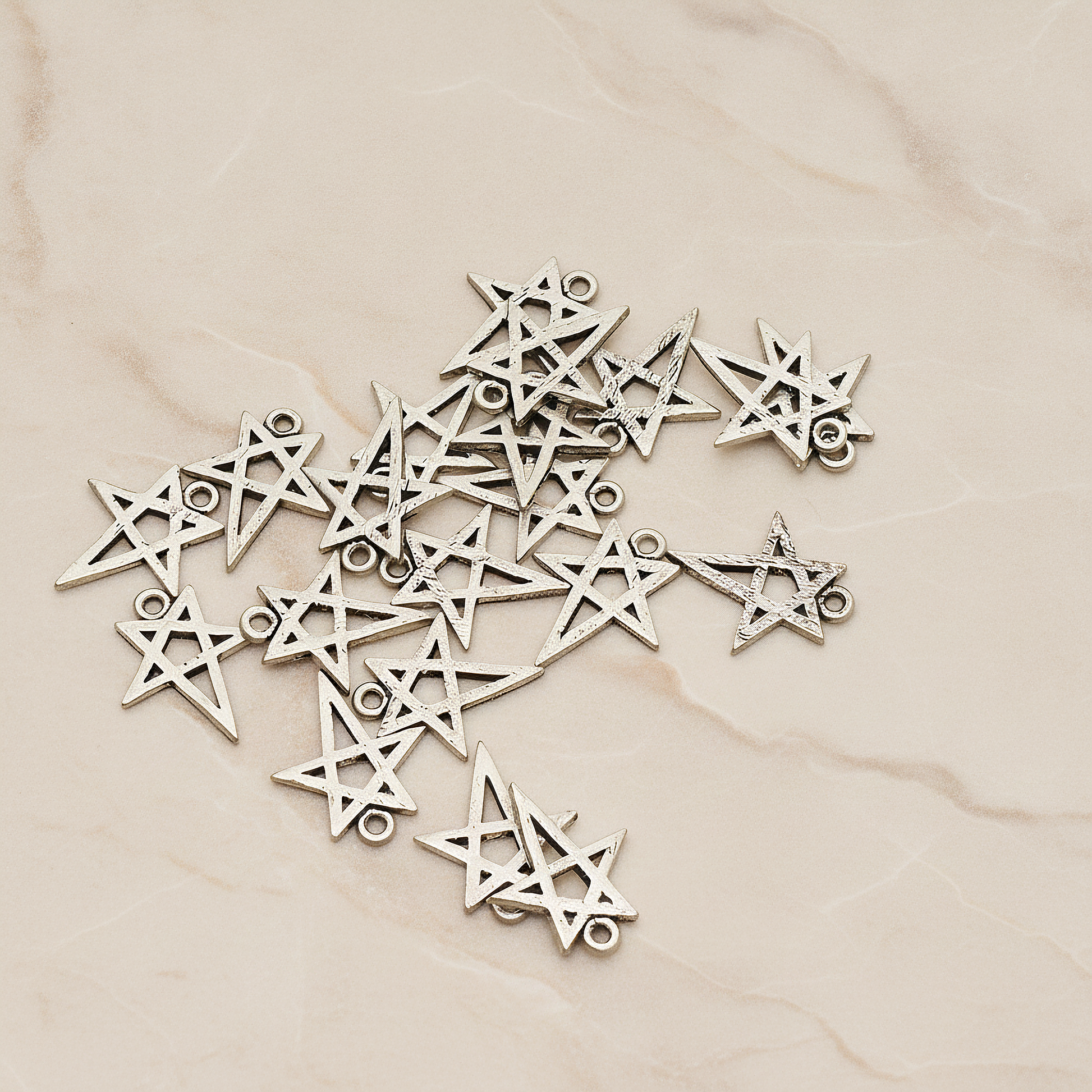 Drawing Star Pendant, 2 Pc on warm marble background (PD.889)