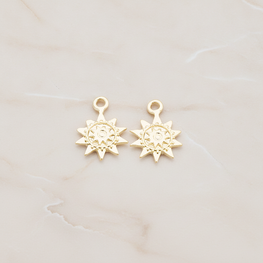 Double Sun Charm Pendant, 2 Pc on warm marble background (PD.906)