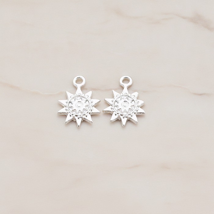 Double Sun Charm Pendant, 2 Pc on warm marble background (PD.906)