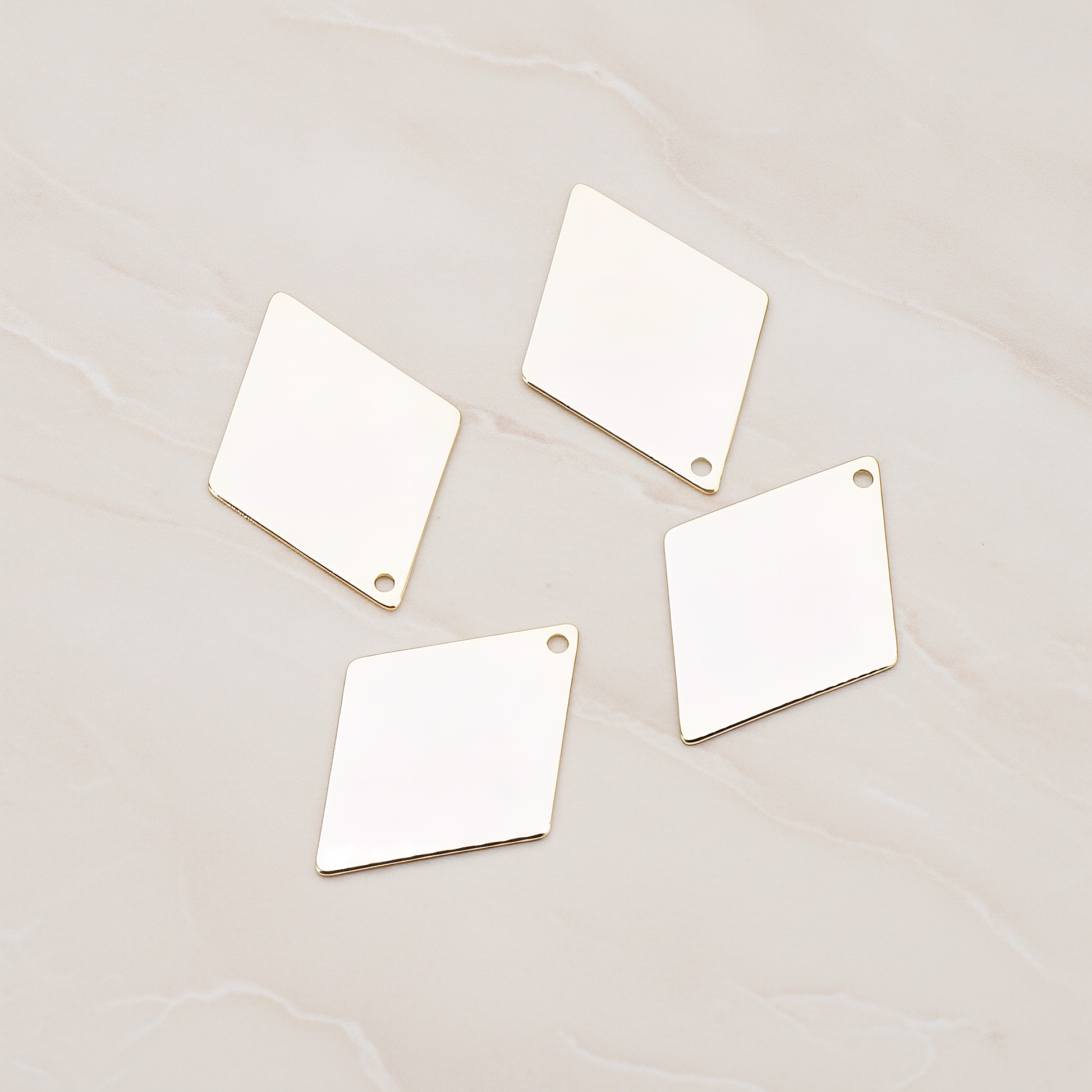 Small Diamond Shaped Pendant, 2 Pc on warm marble background (PD.924-01)