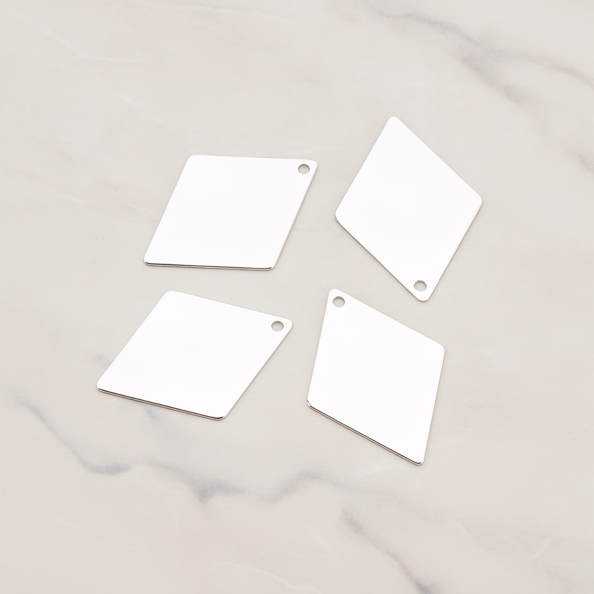 Small Diamond Shaped Pendant, 2 Pc on warm marble background (PD.924-01)