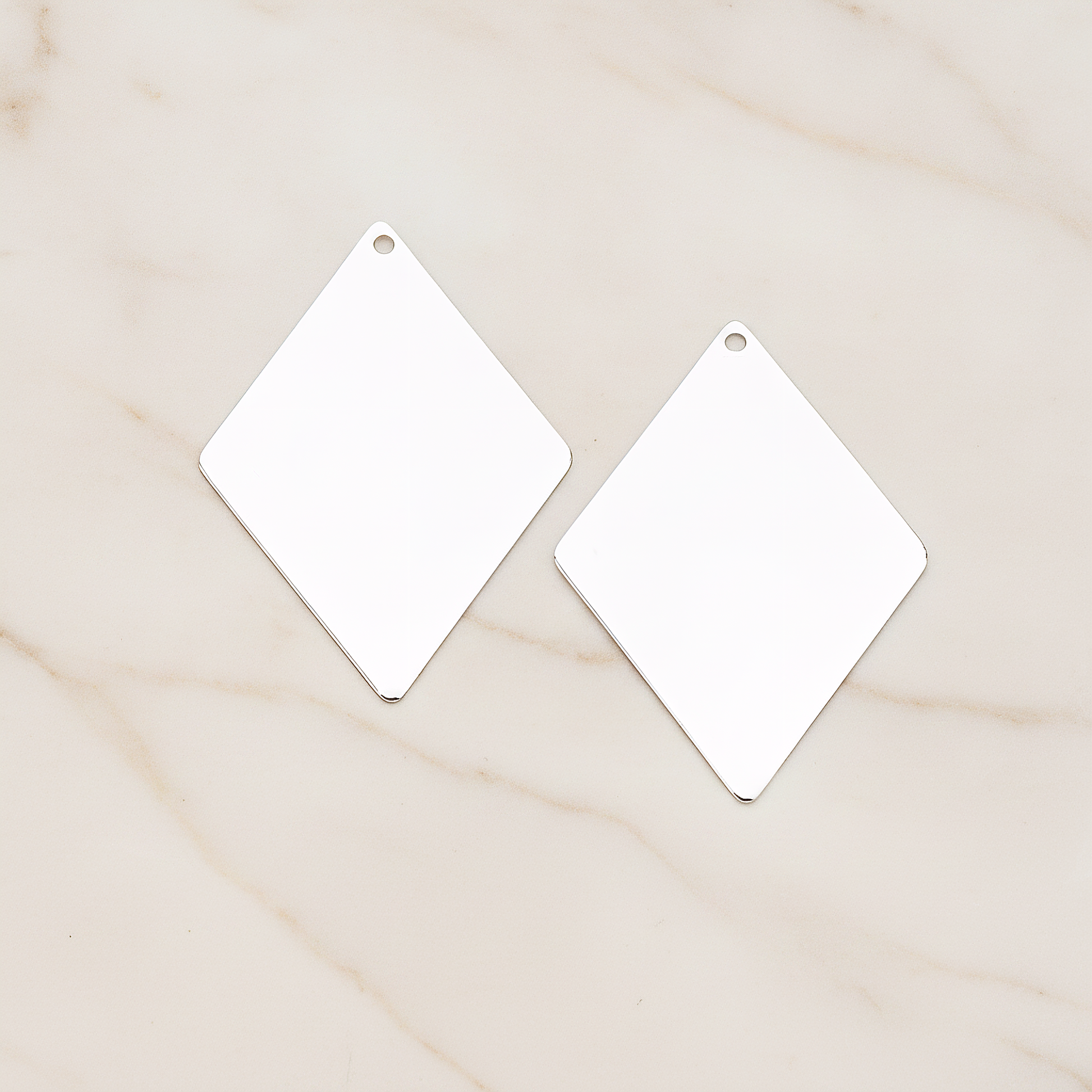 Large Diamond Shaped Pendant, 2 Pc on warm marble background (PD.924-02)