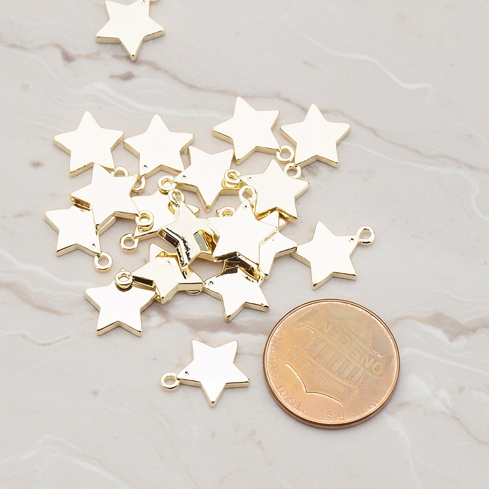 Mini Star Pendant, 2 Pc on warm marble background (PD.925)