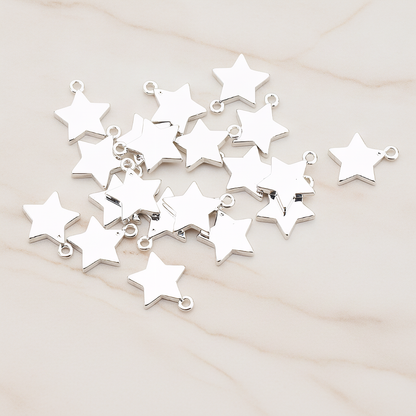 Mini Star Pendant, 2 Pc on warm marble background (PD.925)