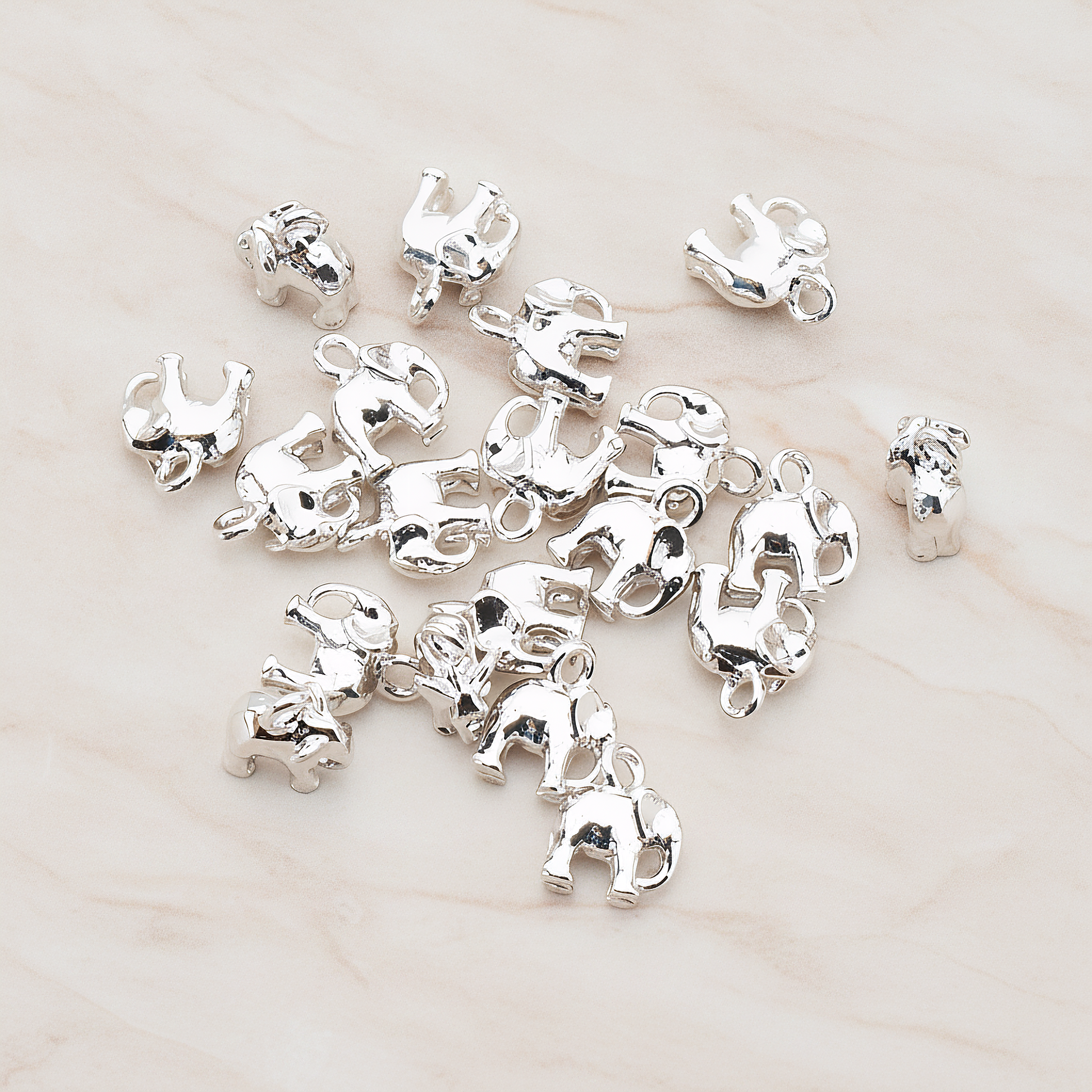 Mini 3D Elephant Pendant, 2 Pc on warm marble background (PD.928)