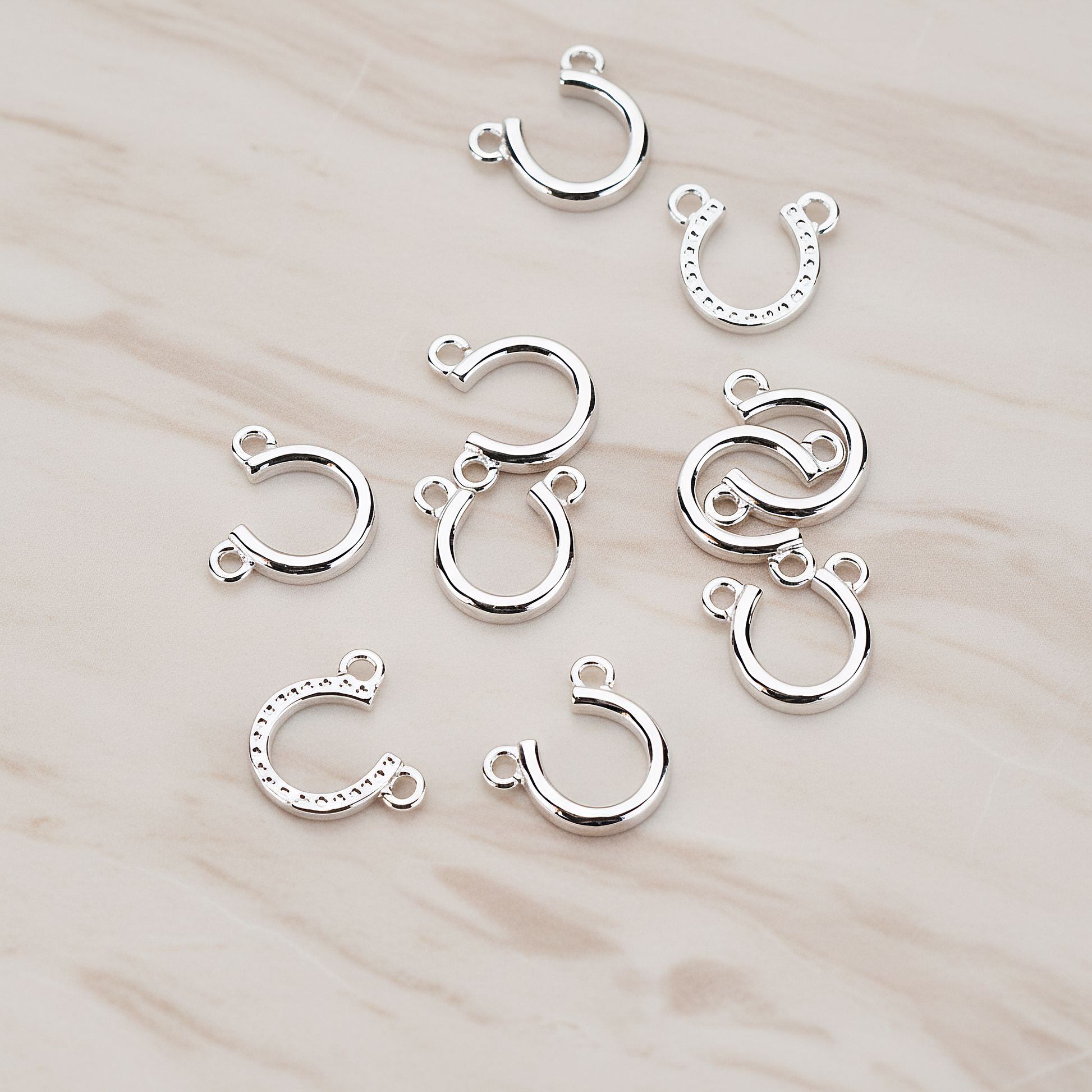 Plated Small Simple Horseshoe Pendant, 2 Pc on warm marble background (PD.996-01)