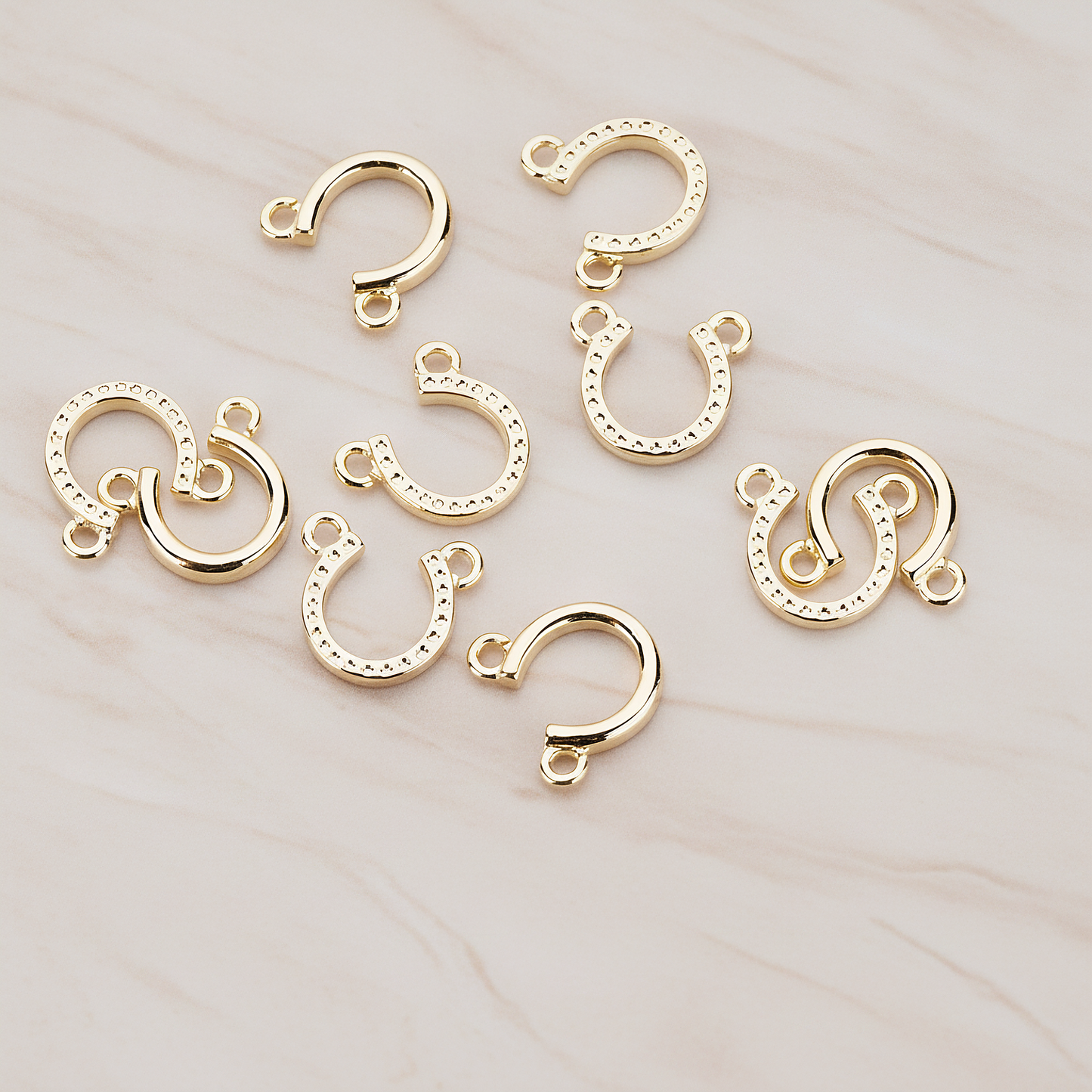 Plated Small Simple Horseshoe Pendant, 2 Pc on warm marble background (PD.996-01)